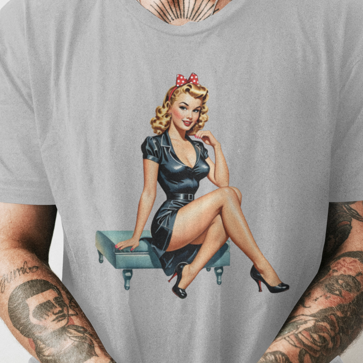 Gray t-shirt with a vintage-style graphic of a woman in a black dress and red bow.