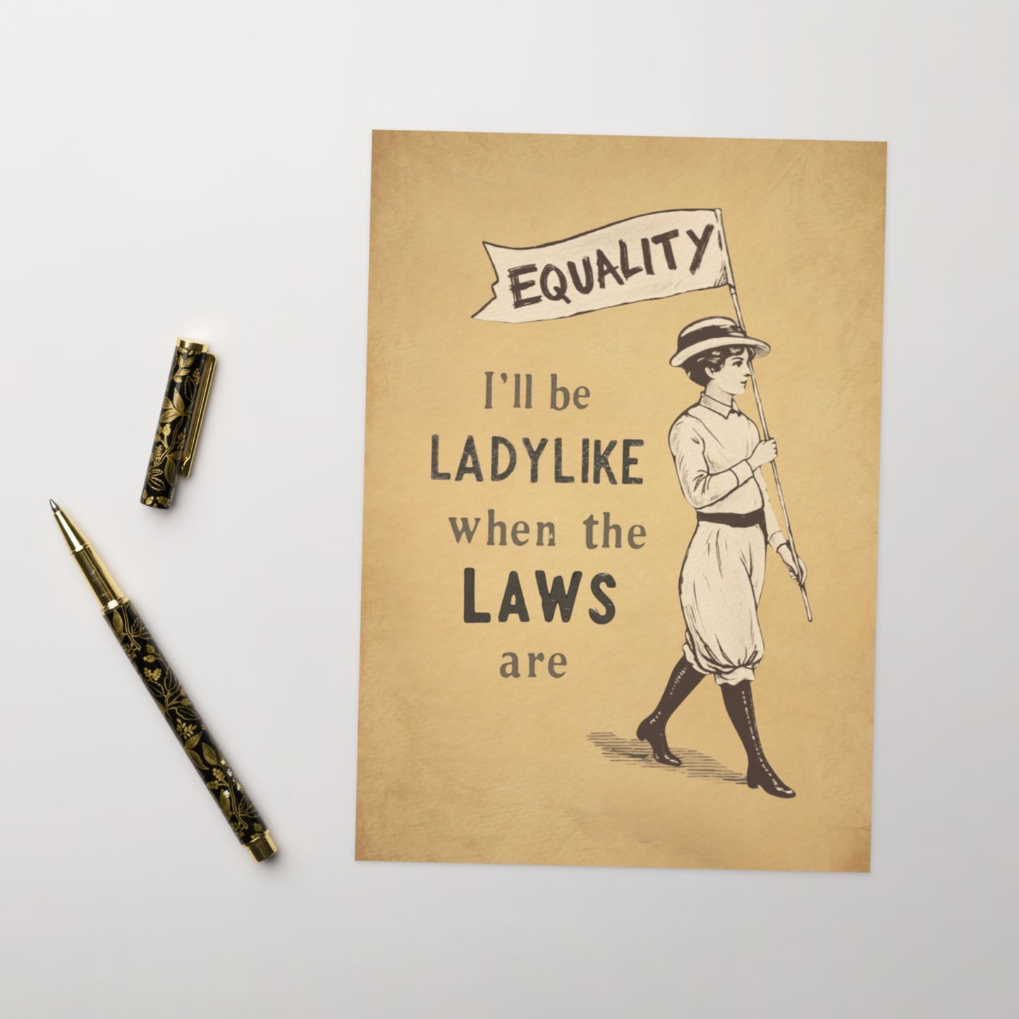 Poster with a vintage-style illustration of a woman holding a 'Equality' banner, accompanied by two pens on a light background.