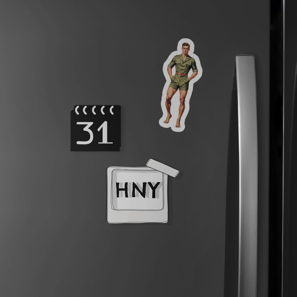 Fridge magnets on a black surface, including a calendar magnet, a person magnet, and a 'HNY' magnet.