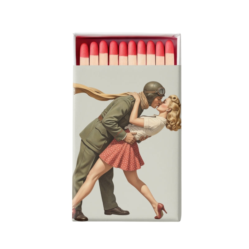 Matchbox with a design of a soldier and a woman embracing, set against a white background.