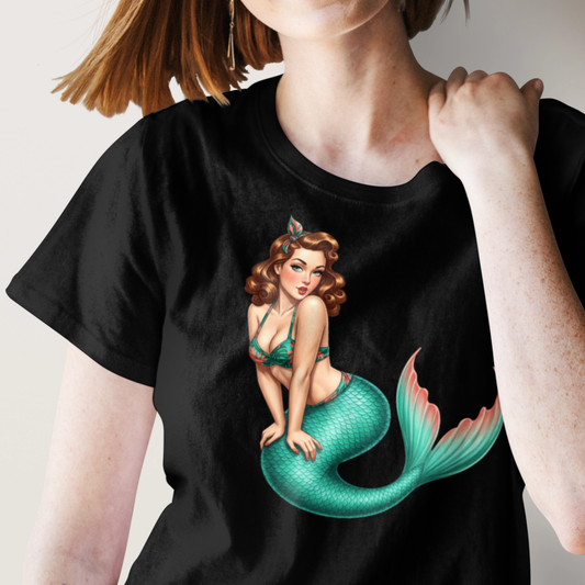 Black t-shirt with a mermaid graphic worn by a person