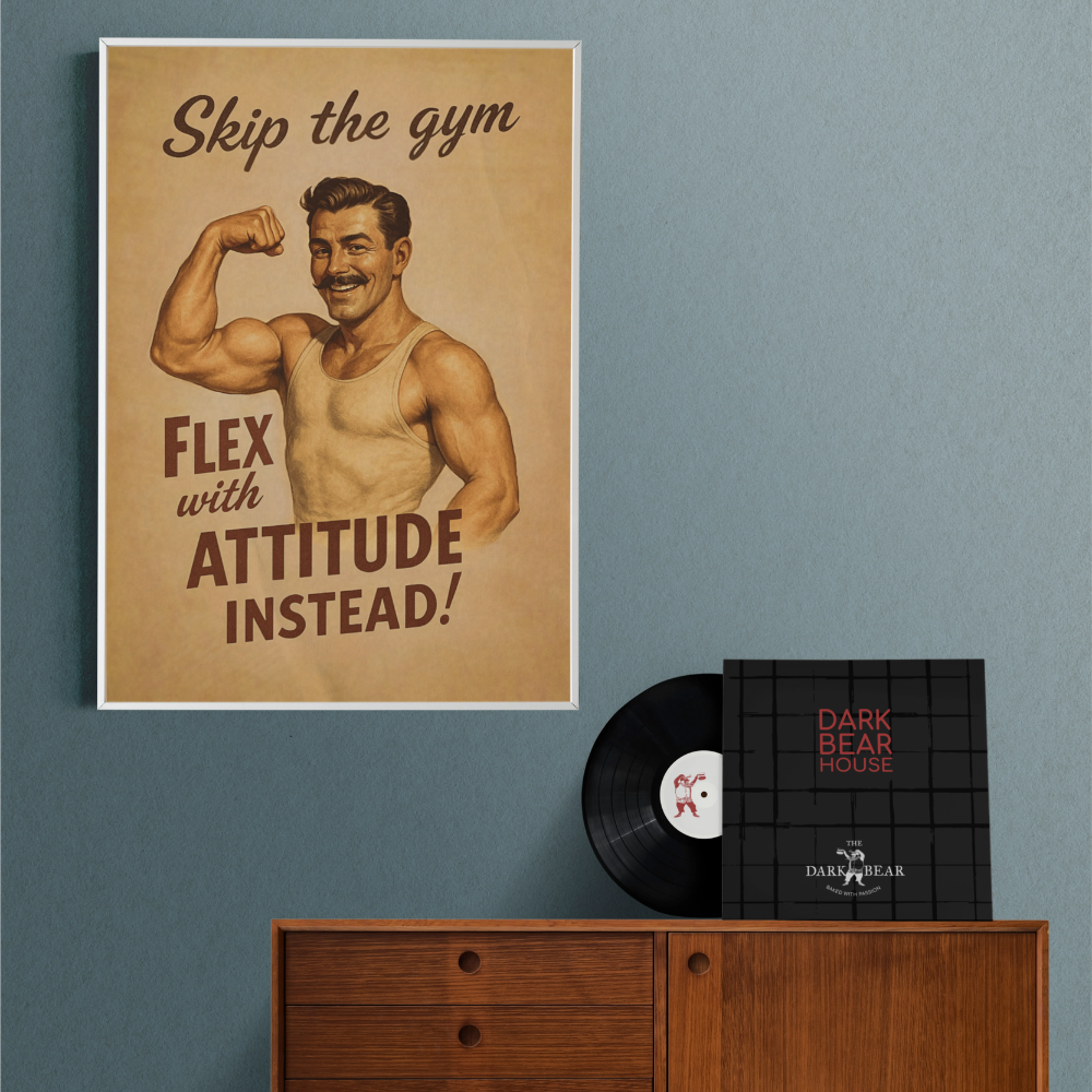 Vintage-style male beefcake poster with a man flexing muscles and text on a blue wall above a wooden cabinet with a record and box set.