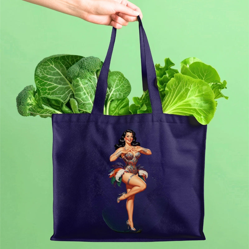 Navy tote bag with a vintage-style illustration of a woman holding vegetables on a green background