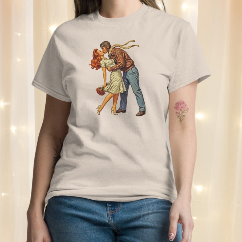Person wearing a t-shirt with a graphic design of a couple embracing.