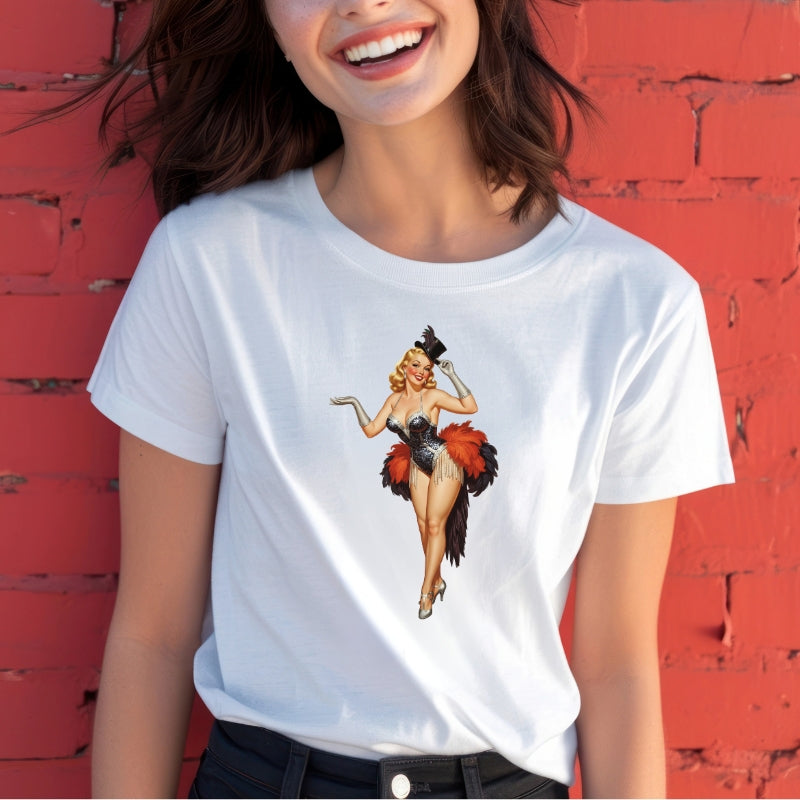 Person wearing a white t-shirt with a graphic design against a red brick wall.