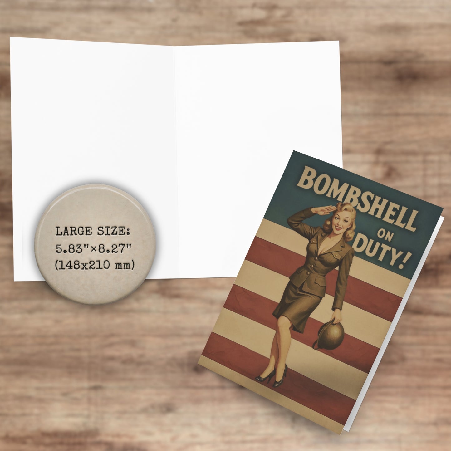 Card titled 'Bombshell on Duty!' with a vintage-style cover featuring a woman and American flag, next to a circular sign saying LAage Size with dimensions detail card on a wooden surface.