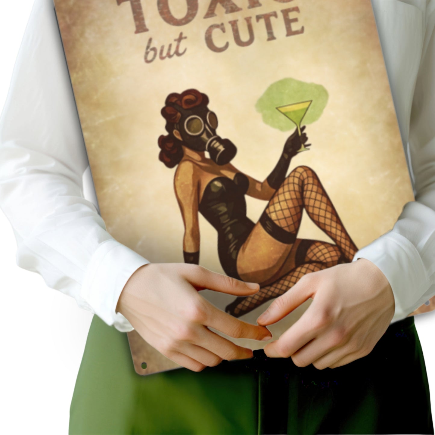 Person holding a book titled 'Toxic but Cute' with a illustrated cover featuring a woman in a gas mask.