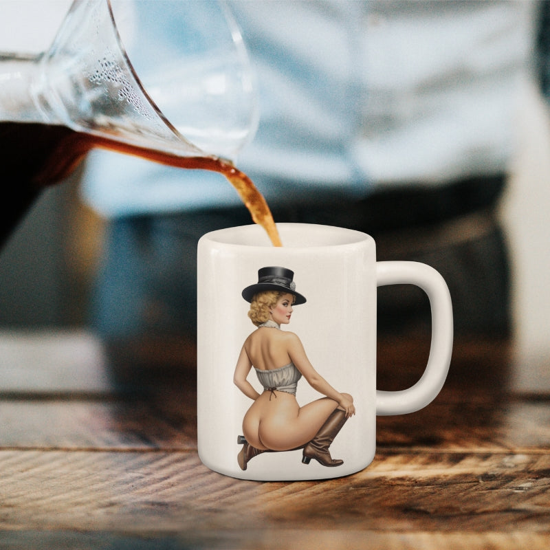 White mug with a graphic design of a woman in a top hat being filled with coffee.