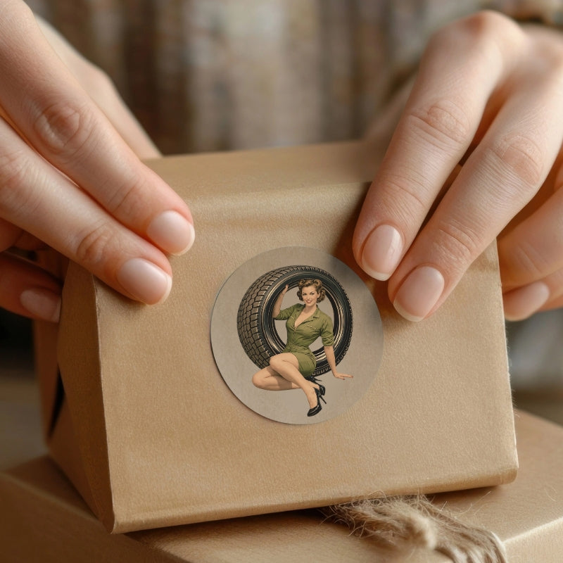 Brown paper box with a decorative sticker featuring a woman in a green dress.