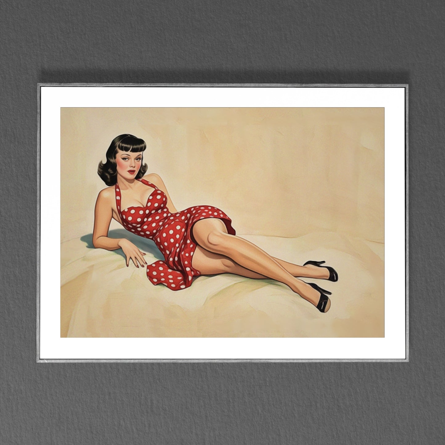 Art print of a woman in a red polka dot dress sitting on a beige surface.