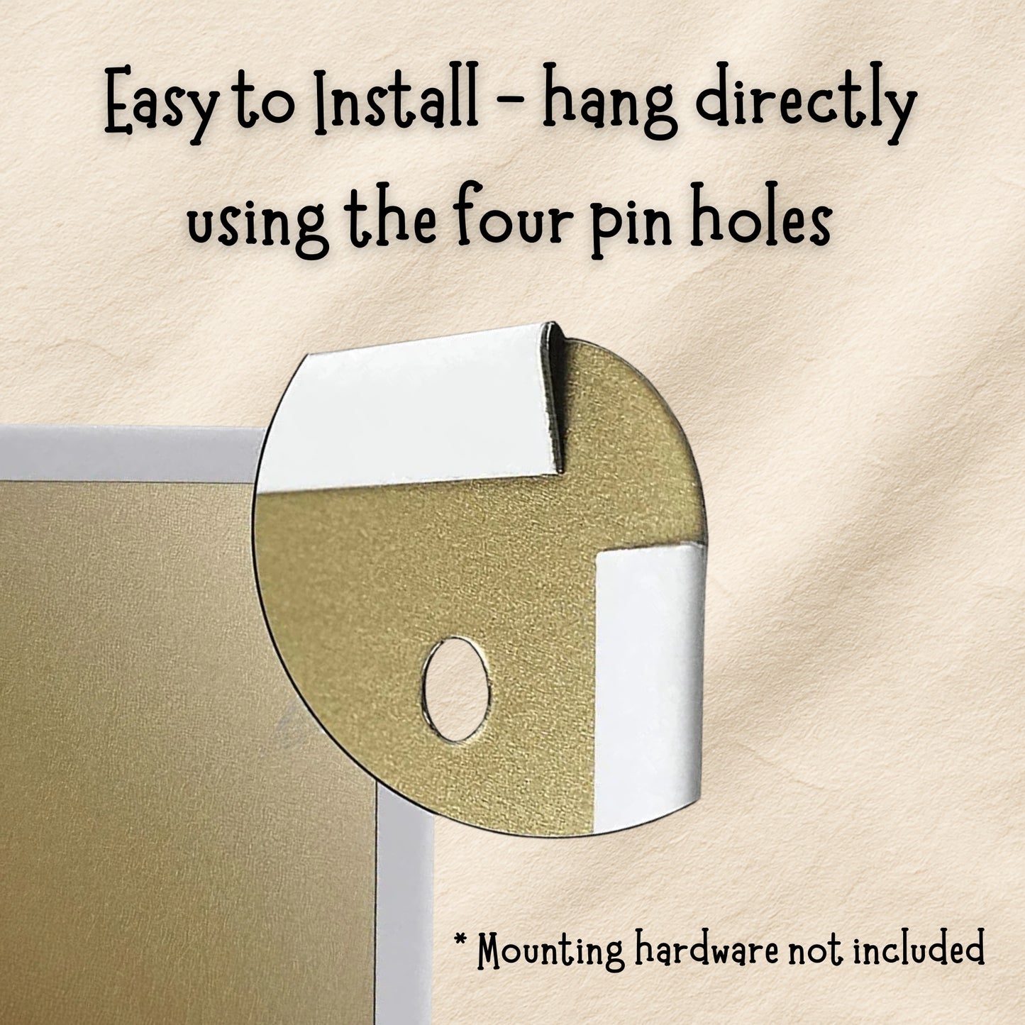 Metallic circular object with text about installation using pin holes on a beige background