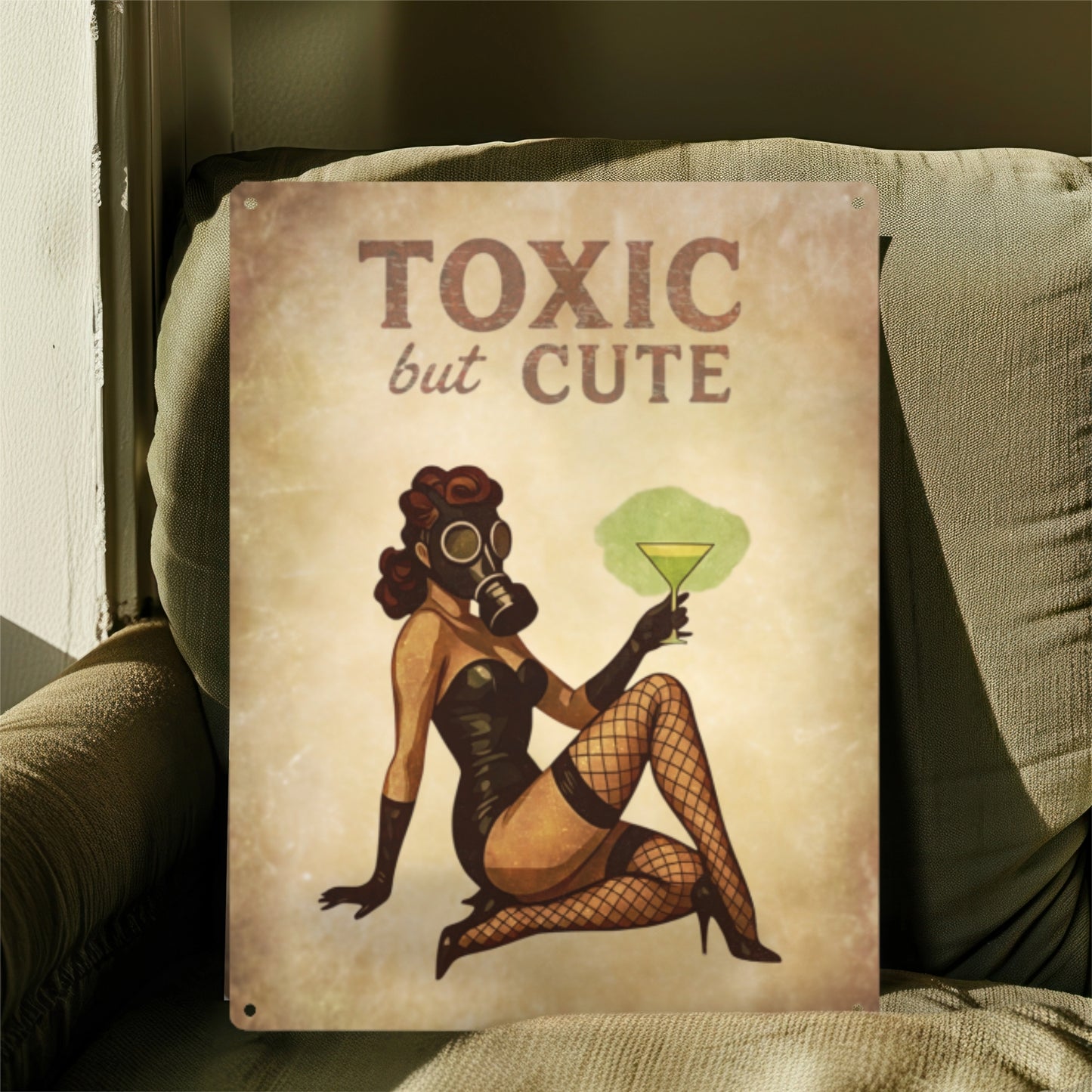 Poster with a stylized illustration of a woman in a gas mask holding a cocktail, with text 'Toxic but Cute', leaning against a textured surface.