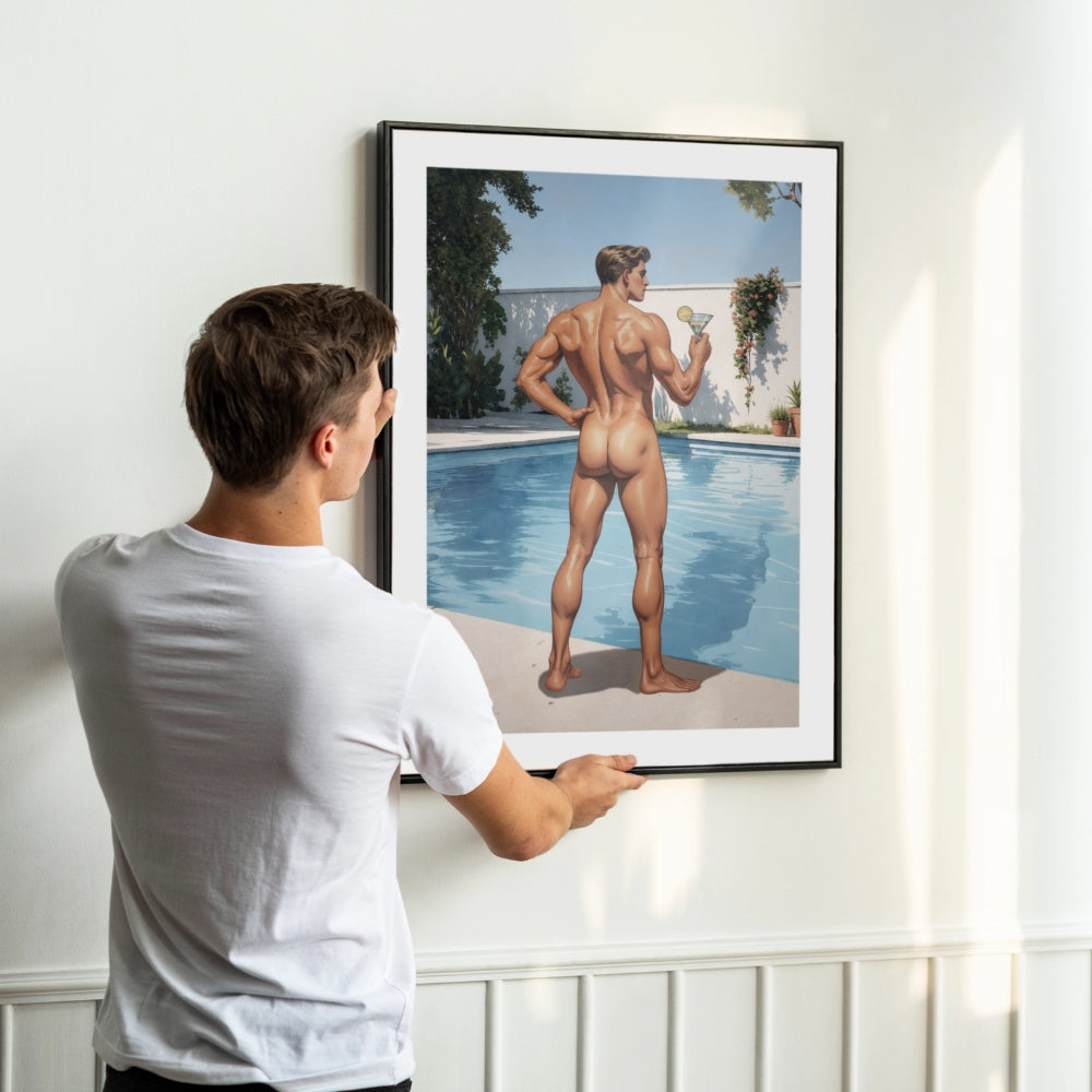 male pinup boy print framed on a wall and held by a man