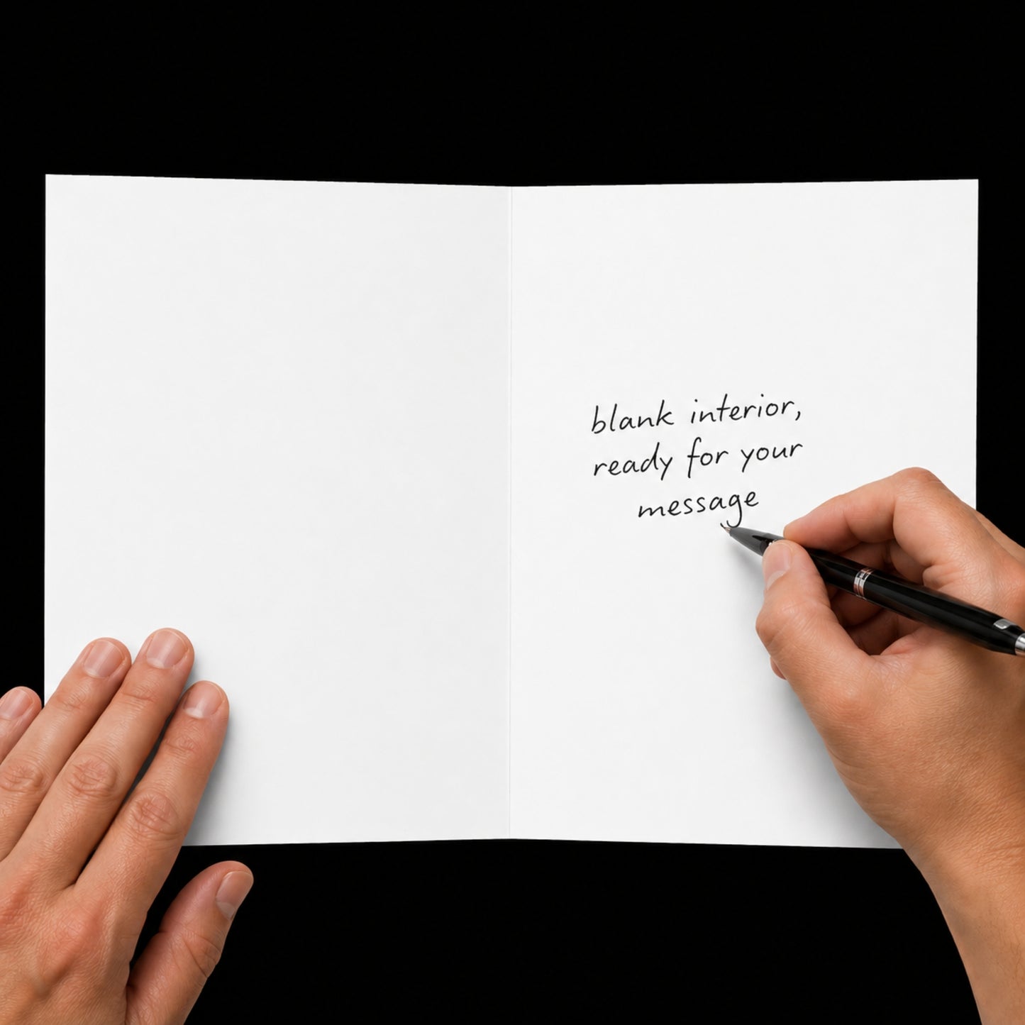 Hand holding a pen over a blank white card with text 'blank interior, ready for your message'.