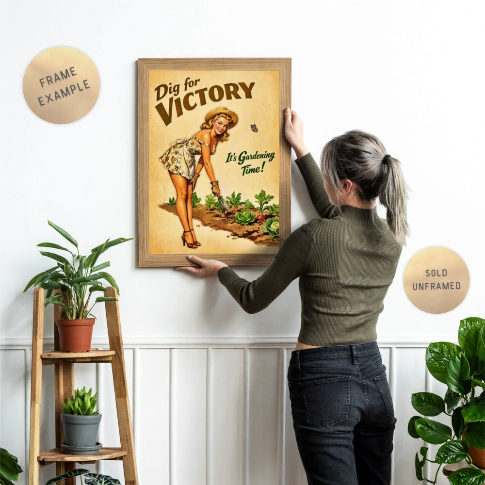 Woman hanging a framed 'Dig for Victory' poster on a wall with plants around.
