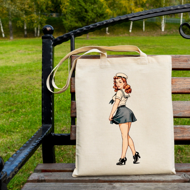 Tote bag with a vintage-style illustration of a woman on a wooden bench outdoors.