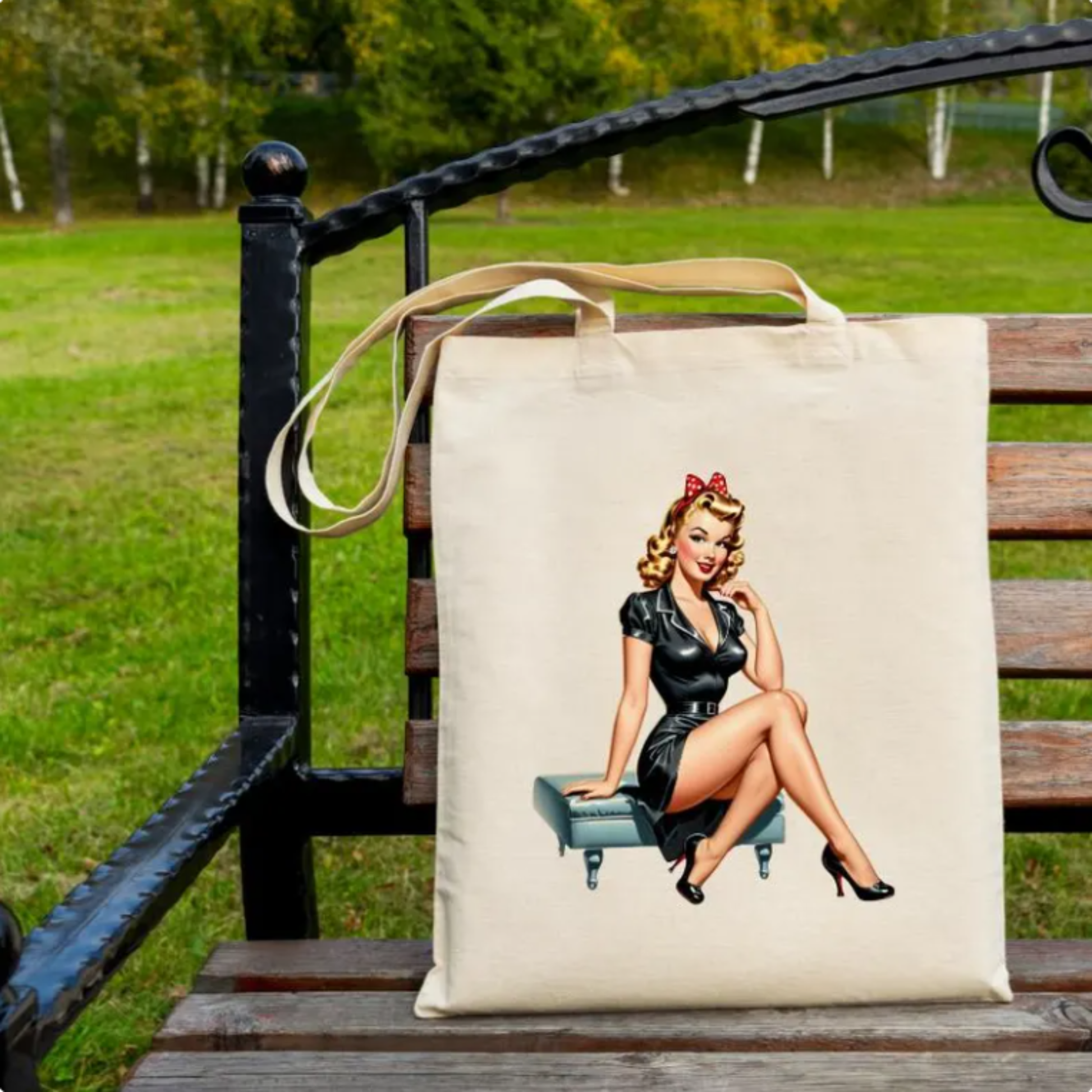 Tote bag with a vintage-style graphic of a woman sitting on a bench outdoors.