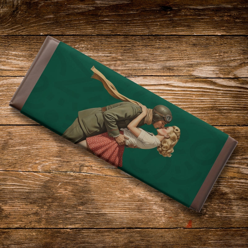Folded fabric with a vintage-style illustration of a couple on a wooden surface