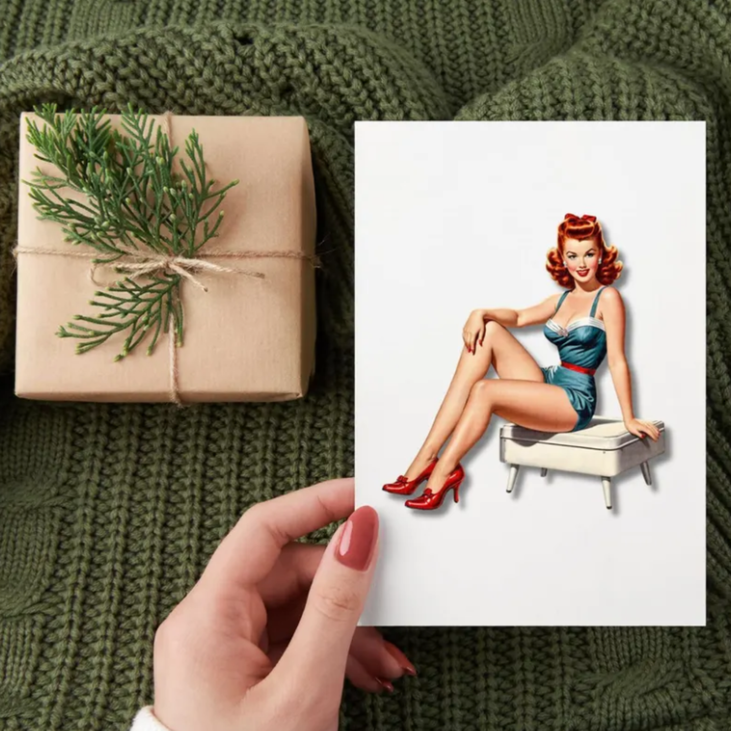 Gift wrapped in brown paper with greenery, held by a hand on a green textured fabric background, next to a vintage-style illustration of a woman.