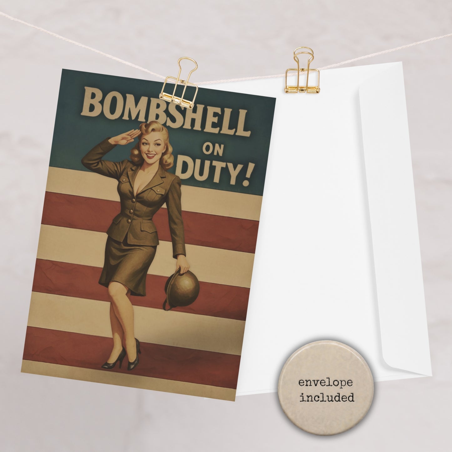 Vintage-style soldier greeting card with a woman in uniform and 'Bombshell on Duty!' text, attached to a white surface with a gold clip.