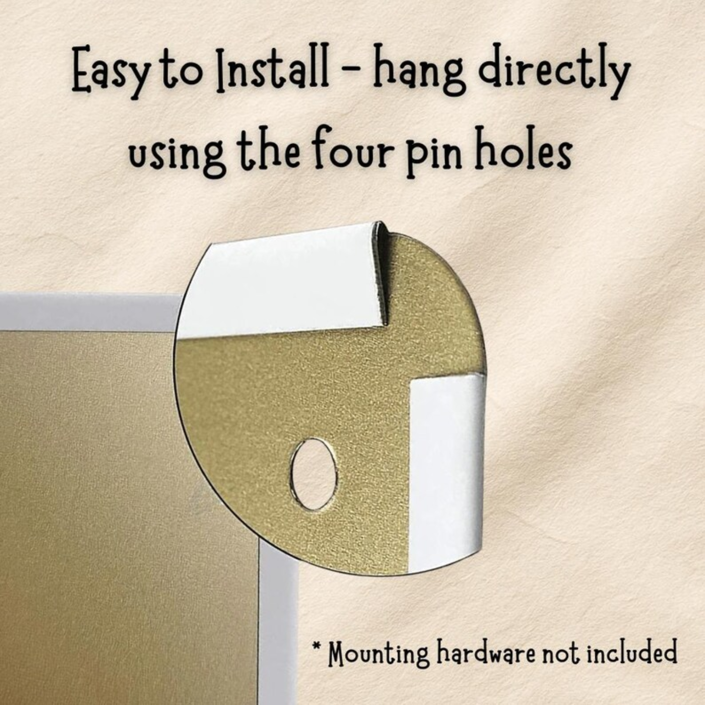 Metallic circular object with text about installation using pin holes on a beige background