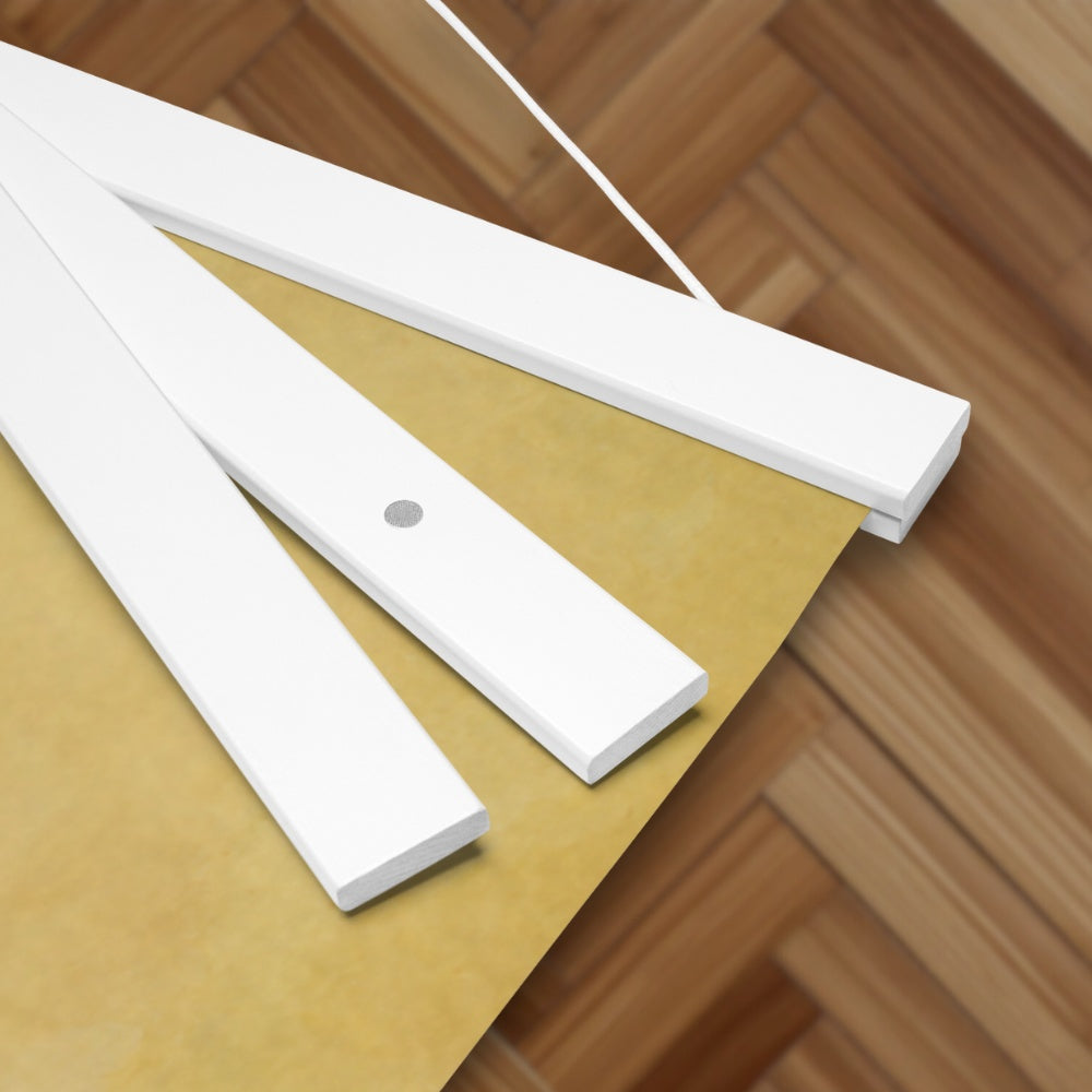 White plastic strips on a wooden surface