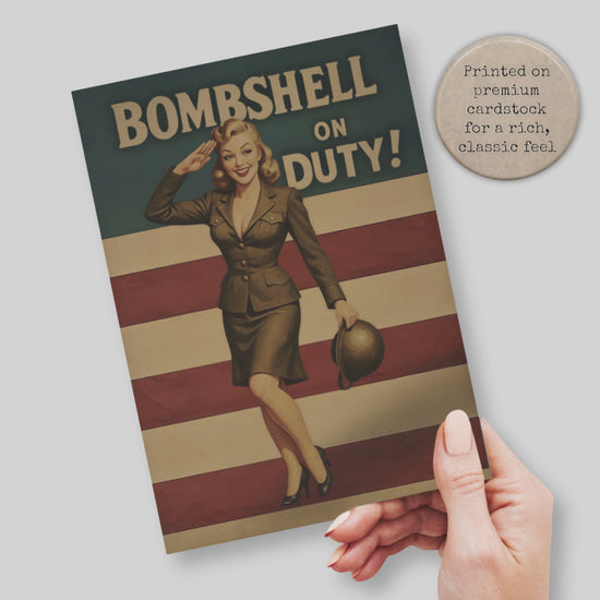 video of a hand holding Bombshell on Duty Retro Pinup Girl Soldier Greeting Card with American Flag background