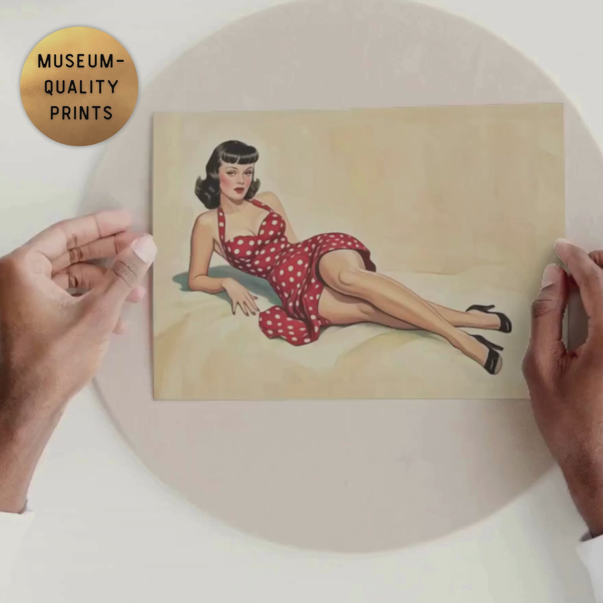 video of hands holding pinup woman in a red polka dot dress art